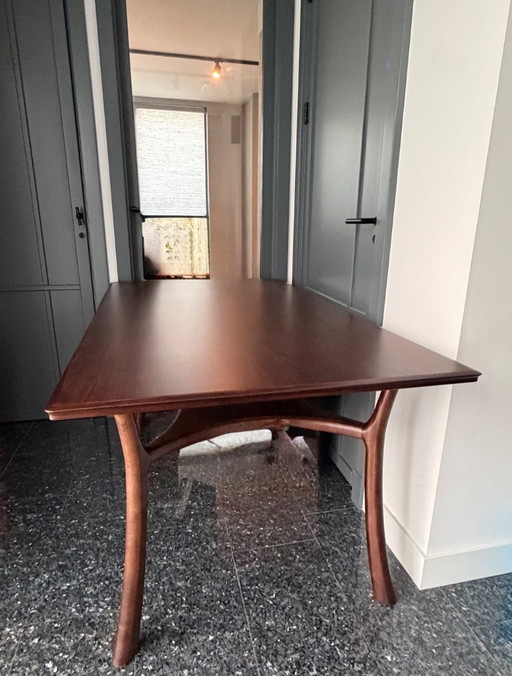 Dining table of solid walnut wood, brown