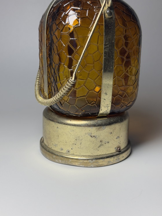 Image 1 of Bouteille carafe musicale vintage – Mécanisme musical à remontoir – Inspiration Steampunk et Art Déco – vers 1970