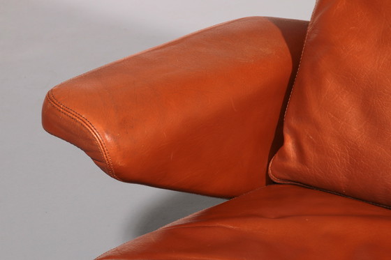 Image 1 of Cognac Leder COR Swing Lounge Stuhl mit Ottomane von Adolf & Schöpfer 1976