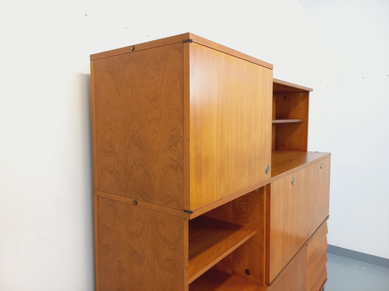 Image 1 of Louis Paolozzi's vintage modernist secretary bookcase for Monopoly in teak and metal from the 60s