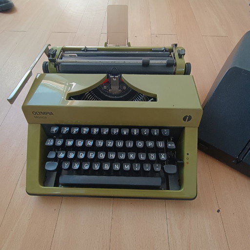 Original 70s travel typewriter from Olympia International, model Monica