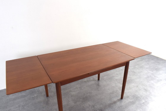 Image 1 of Table de salle à manger extensible en teck danois, style milieu du XXe siècle, années 1960.