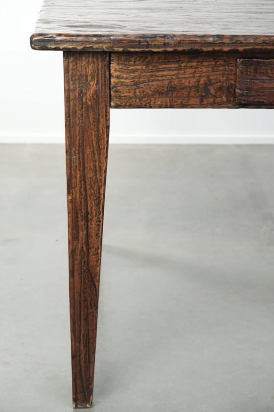 Image 1 of Grote boeren eettafel van sfeervol iepenhout met een prachtig patina uitgevoerd met drie lades