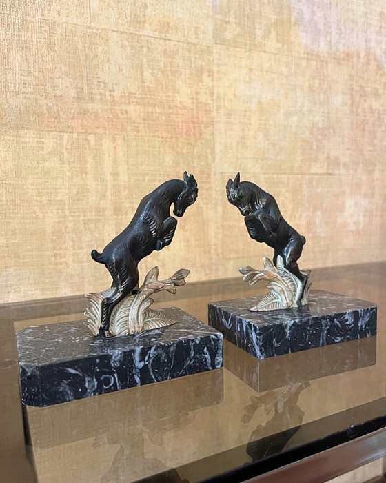 Image 1 of Fermalibri Art Déco vintage – Bronzo e marmo Portor – Francia, 1930