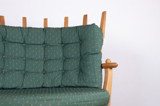 Image 1 of Gran sillón francés de roble macizo diseñado por Guillermo y Chambron para Your Home en 1960.