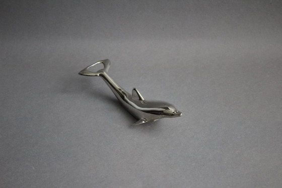 Image 1 of Décapsuleur vintage dauphin en métal argenté