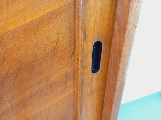 Image 1 of Vintage eikenhouten kledingkast uit de jaren 60