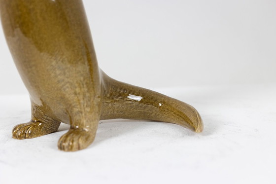 Image 1 of Valérie Courtet, Lontra in chamotte e gres smaltato. Opera contemporanea