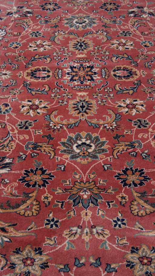 Grand tapis aux tons rouges et roses 345x250cm