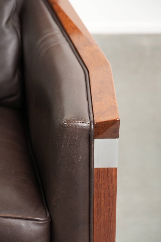 Image 1 of Luxe Schuitema Art Deco design set bestaande uit een fauteuil en hocker uit de Decoforma serie in chocolade bruin rundleer