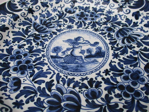 Old Delft, Blue and white plate and bowl, Old Delft pottery, painted by P.H.v. Praag.
