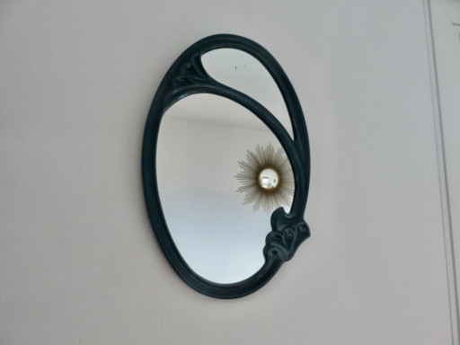 Art Nouveau mirror in enameled cast iron in the style of Hector Guimard