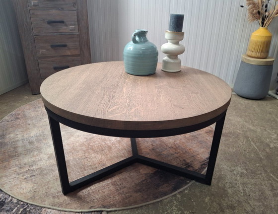 Image 1 of Robust coffee table made of solid oak and metal base