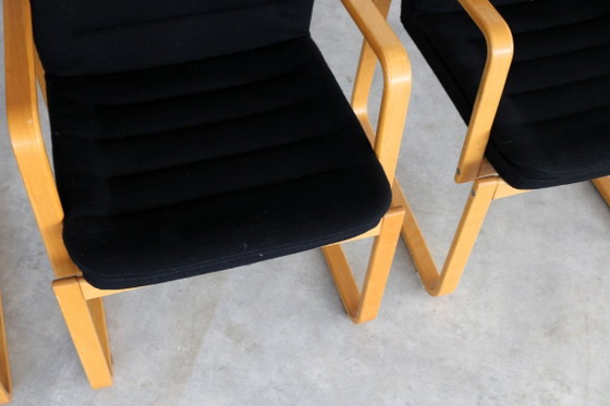 Set of four Dining chairs with wooden frame and black upholstery, Textile, Scandinavian (photo 6 of 10)