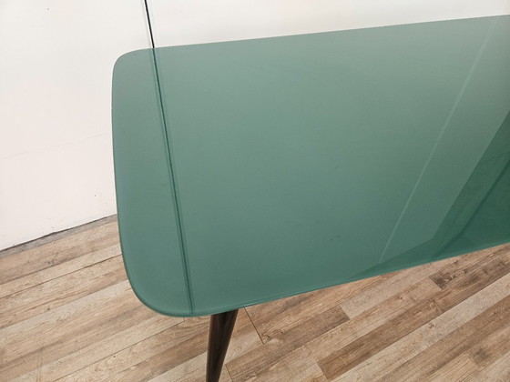 Image 1 of Mid-century mahogany dining table with aquamarine glass top
