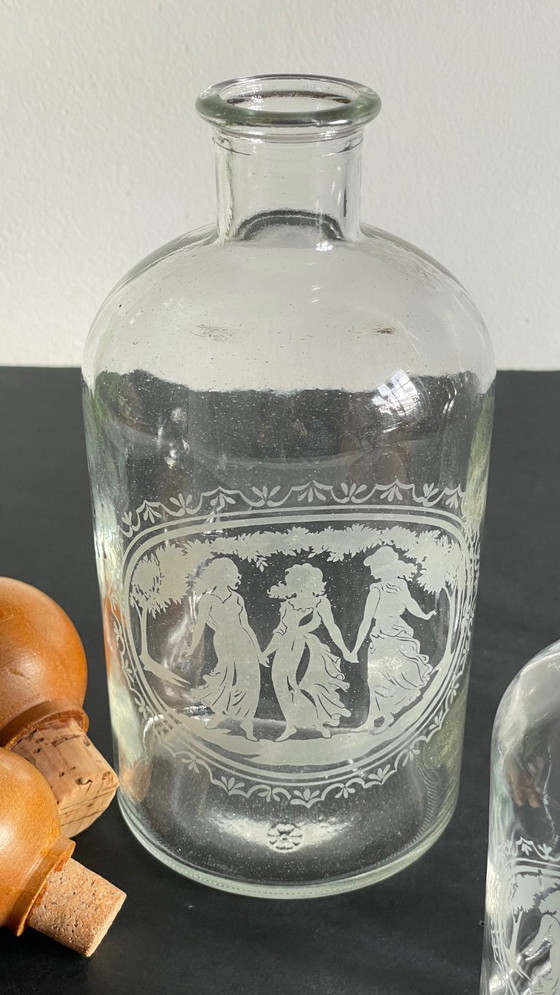 Image 1 of Vintage Engraved Glass and Wood Bottles