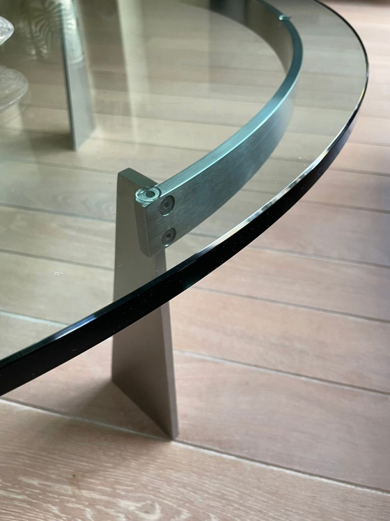 Round coffee table with glass top and metal base, Transparent, Modern (photo 2 of 5)