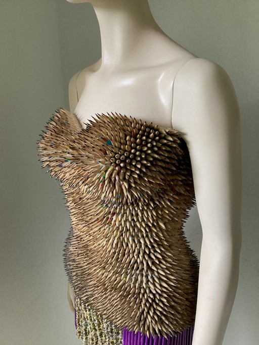 Beautiful doll covered with 6,000 pieces of pencil