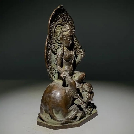 statue de bouddha en bronze