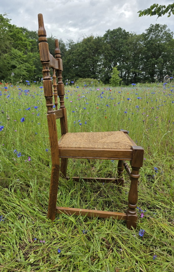 Image 1 of Set van 4 massief eiken stoelen met rieten zitting