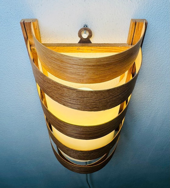 Image 1 of Elegant mid-century wall lamp crafted from curved pine veneer, produced in Sweden during the 1960s.