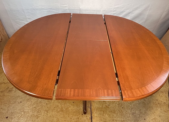 Image 1 of Mid-Century Retro Vintage Teak Extending Round Dining Table by Parker Knoll – 1970  Elegant | Space-Saving | Practical | Iconic 