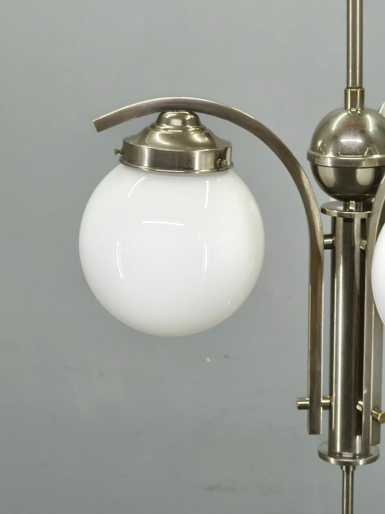 Image 1 of Art Deco kroonluchter uit de jaren 30 van nikkel met opaalglazen bollen.