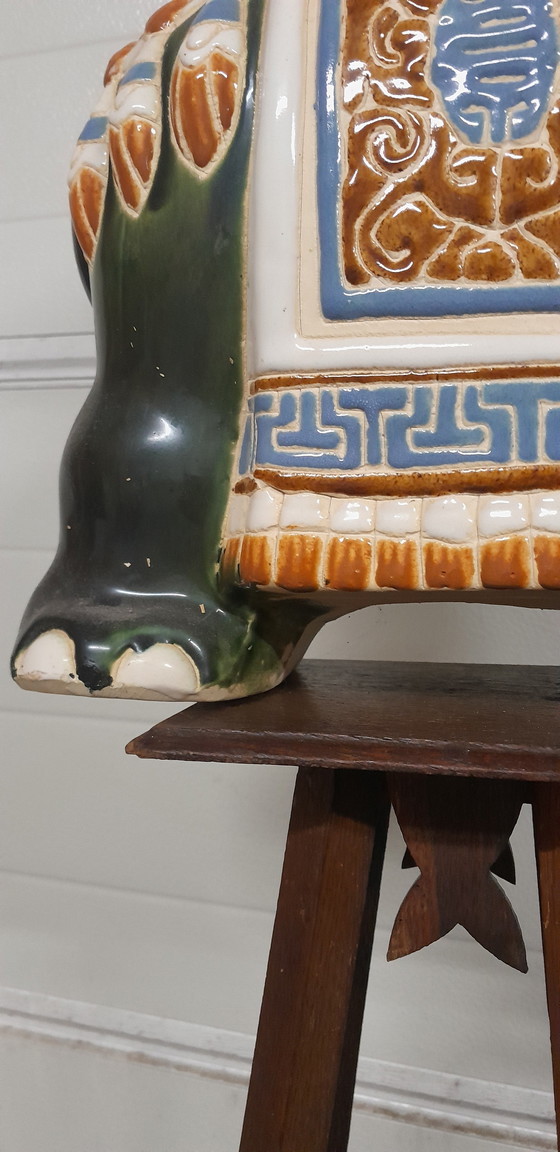 Image 1 of Tavolo in ceramica con pianta di elefante