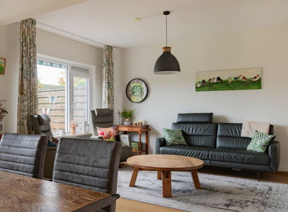 Image 1 of Divano in pelle verde scuro, largo 2 metri