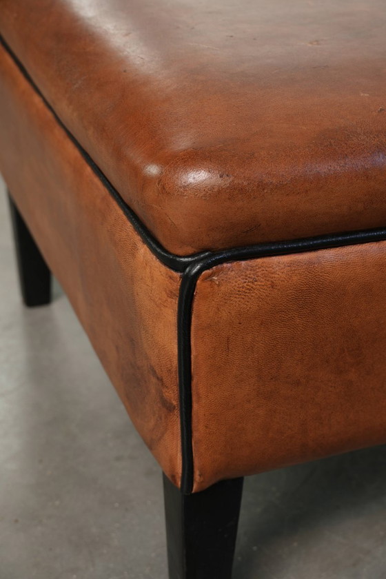 Versatile sheepskin leather footstool/pouf in a warm cognac color – Footstools & poufs, Klassiek (photo 9 of 10)