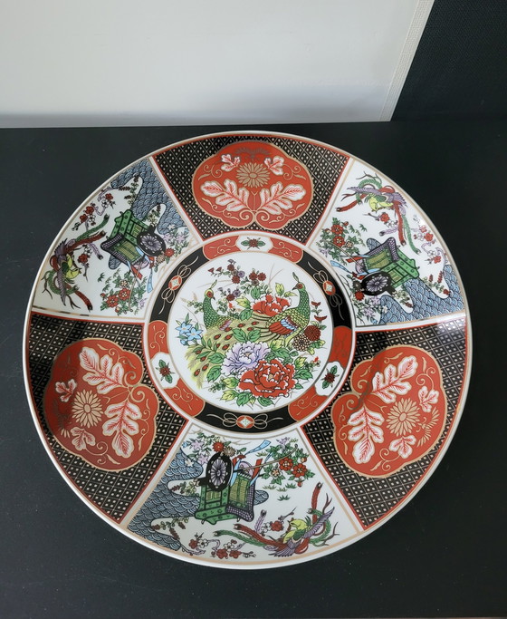 Image 1 of Piatto giapponese in ceramica Imari con motivo a pavone.