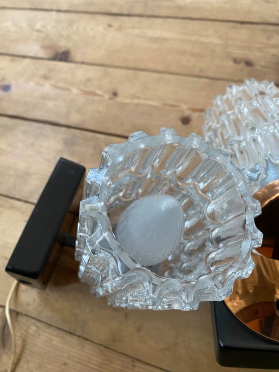 Image 1 of Een paar vintage koperen wandlampen van Phillips uit de jaren 70.