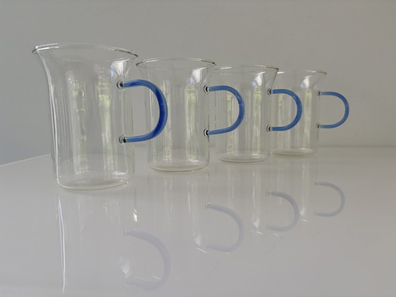 Image 1 of Set of four glass tea mugs with colored handles