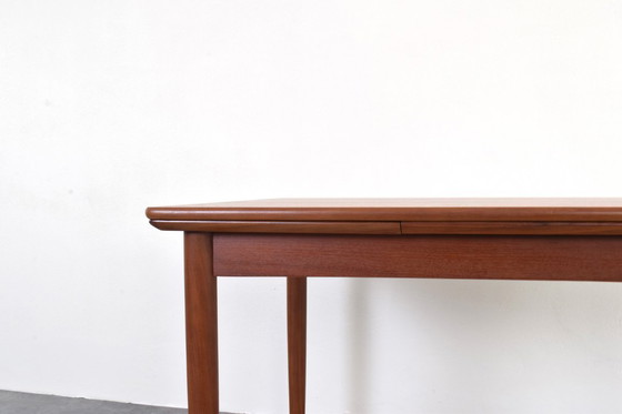 Image 1 of Table de salle à manger extensible en teck danois, style milieu du XXe siècle, années 1960.