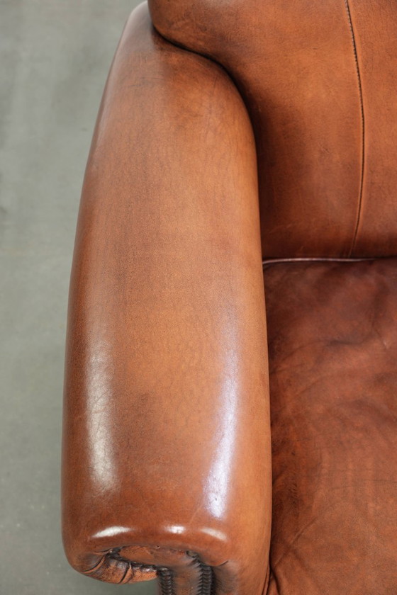 Vintage schapenleren armchair met een comfortabele zit en afgewerkt met siernagels – Fauteuils, Leather (photo 7 of 14)