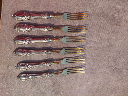Set van 6 zilveren dessertvorkjes (800 euro)