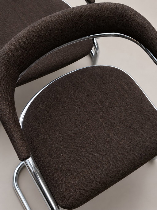 Set of 4 vintage tubular frame dining chairs
