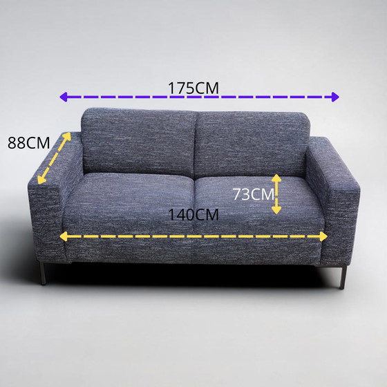 Image 1 of Comfortable two-seater sofa in black white/grey fabric (professionally cleaned)