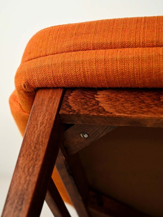 Image 1 of Een paar oranje Oslosund fauteuils van Kinnarps, jaren 1950.