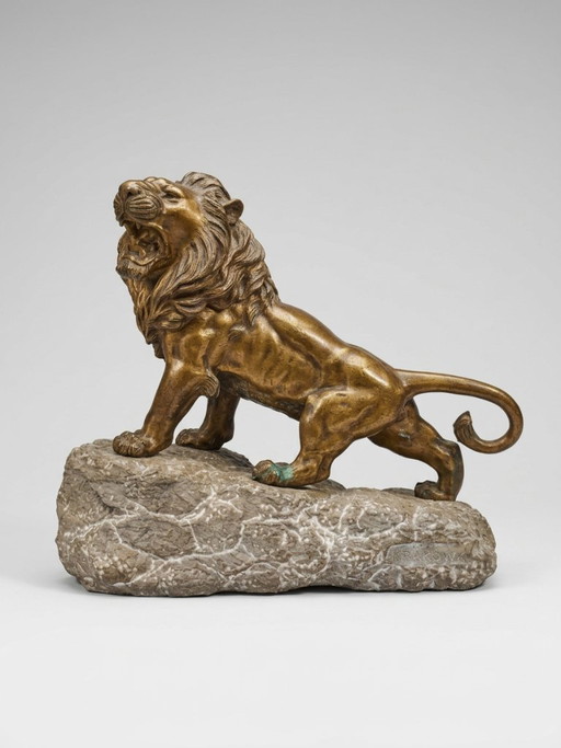 KRAKOWKI — Leone ruggente sulla sua roccia, importante Sculture in bronzo d'arte e roccia (28,3 kg)