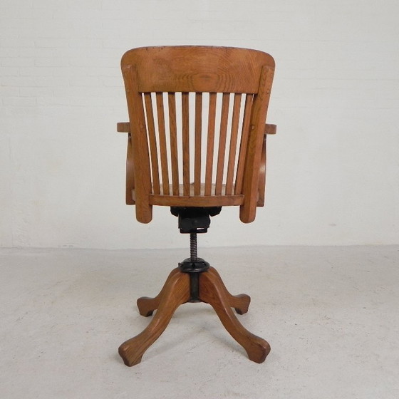 Silla de oficina de roble con sistema de muelles ajustable y regulación de altura, década de 1950. (photo 17 of 35)