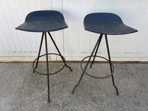 Pair of industrial metal swivel barstools 50s
