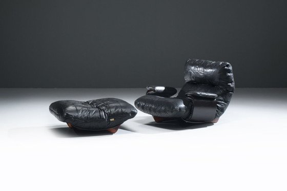 Image 1 of Rara poltrona e pouf Marsala in pelle nera - Michel Ducaroy - Ligne Roset
