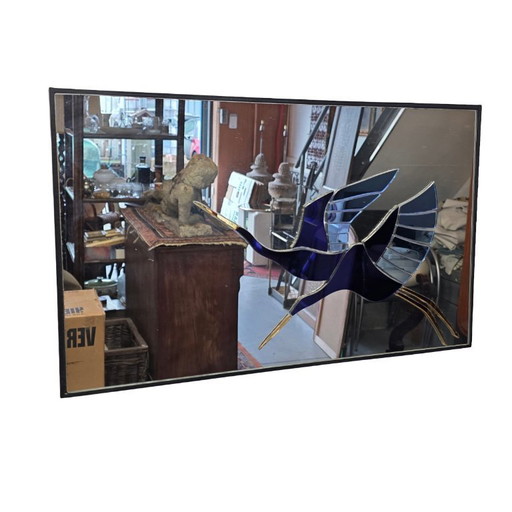 Espejo de diseño vintage con pájaros.