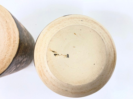 Image 1 of   1 jug and 4 mugs from the 50s 60s by Gotlind Weigel.  Ceramic.  Good used condition. Some chips to the rim