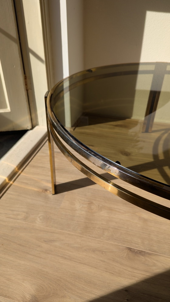 Image 1 of Hollywood Regency salontafel van zwart messing en gerookt glas