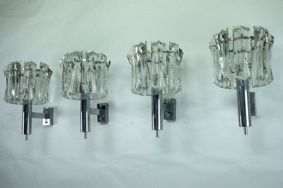 Image 1 of Ensemble de quatre grandes appliques en verre de Murano et en laiton chromé, Italie, années 1960.