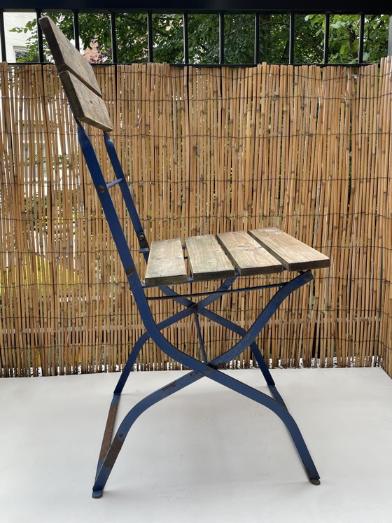 Image 1 of Vintage wooden bistro folding chair – blue metal frame