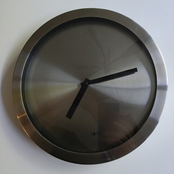Image 1 of Minimalist wall clock by Zack in brushed stainless steel.