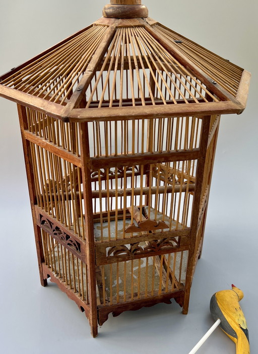 Decorative handcrafted birdcage with wooden bird – Asia, circa 1950s–1960s